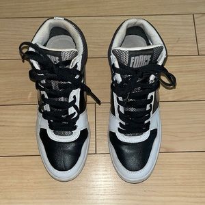 Women’s Nike Sky High Wedge Tennis Shoes.